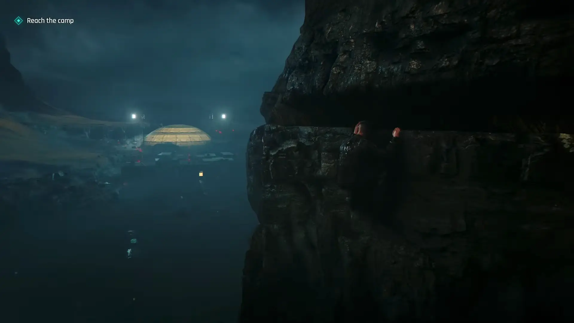 A dizzying shot of Bond desperately hanging onto a rocky handhold on a sheer cliff face, showcasing the game's dramatic traversal mechanics.