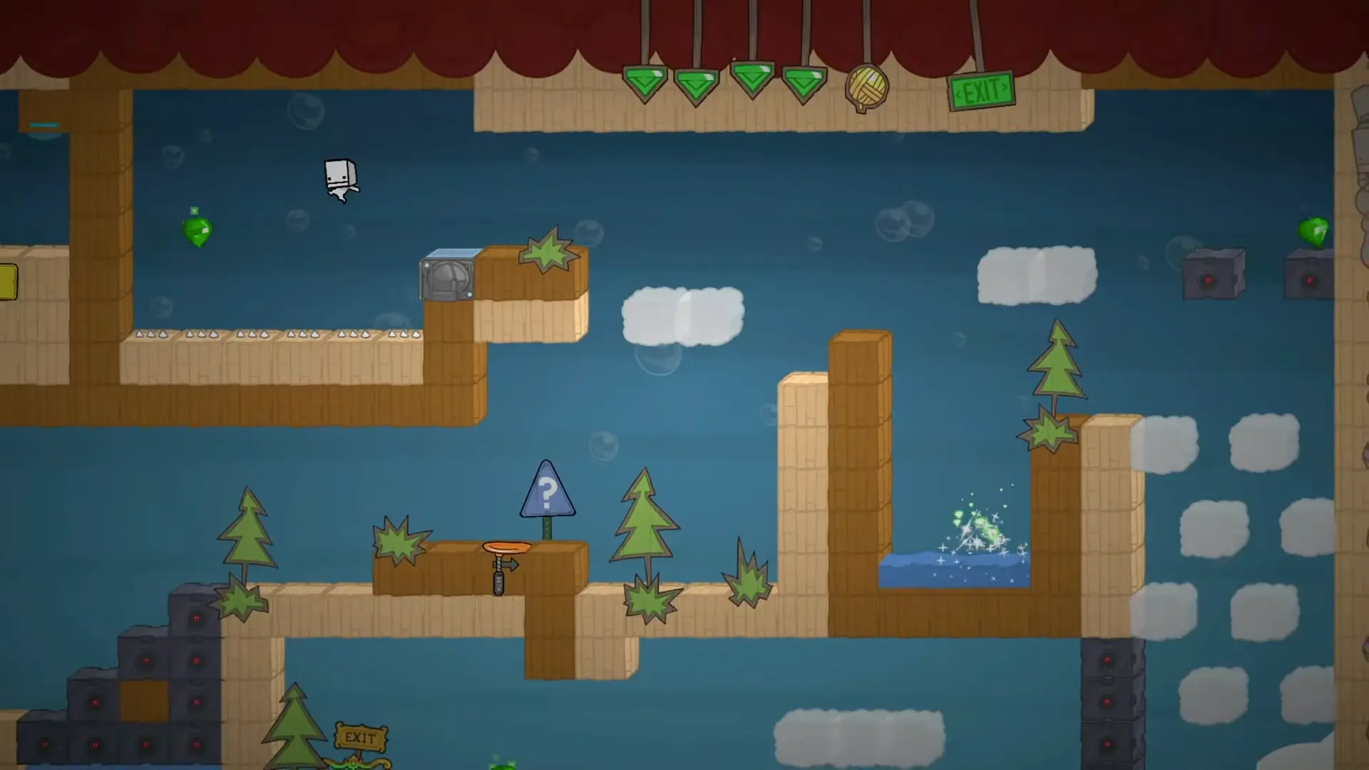 A frantic moment of a blocky prisoner mid-leap, about to grab a green gem hovering over a pit of spikes.
