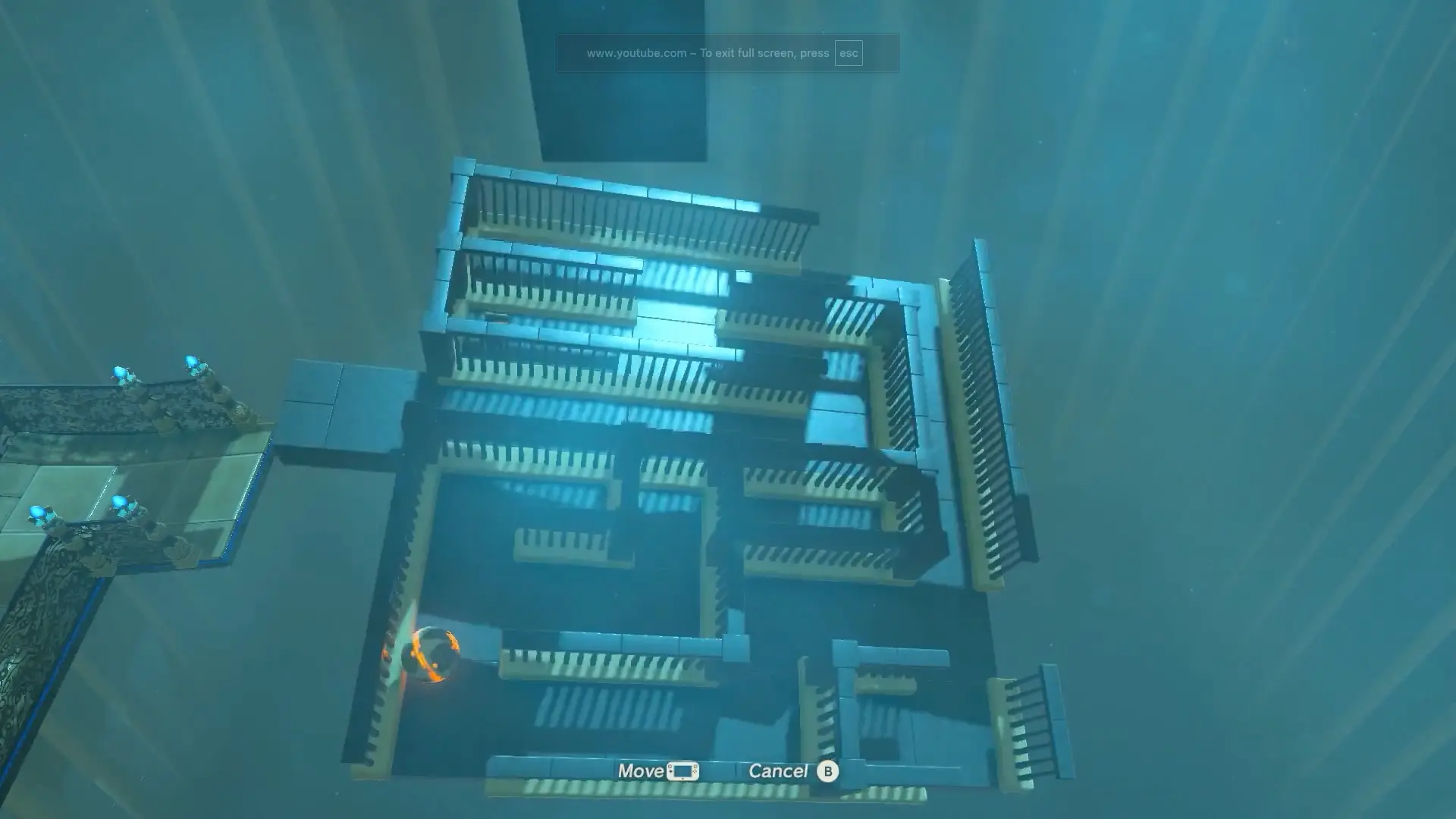 The glowing neon-orange interior of a Sheikah Shrine, showing a complex physics puzzle involving a massive stone sphere and an incline.