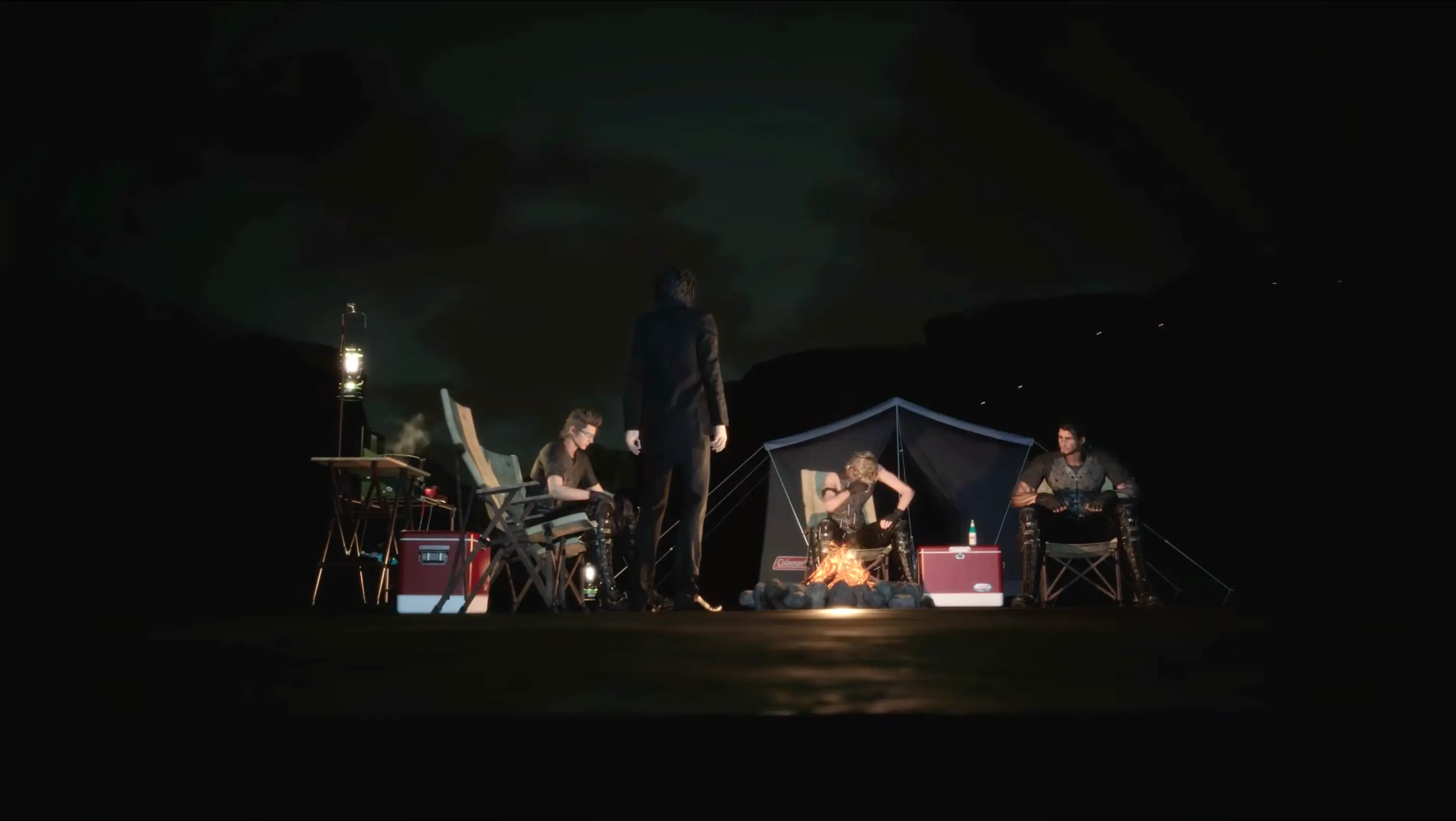The four brothers sitting around a campfire in the dark, a deeply emotional and intimate moment from the game's final scenes.
