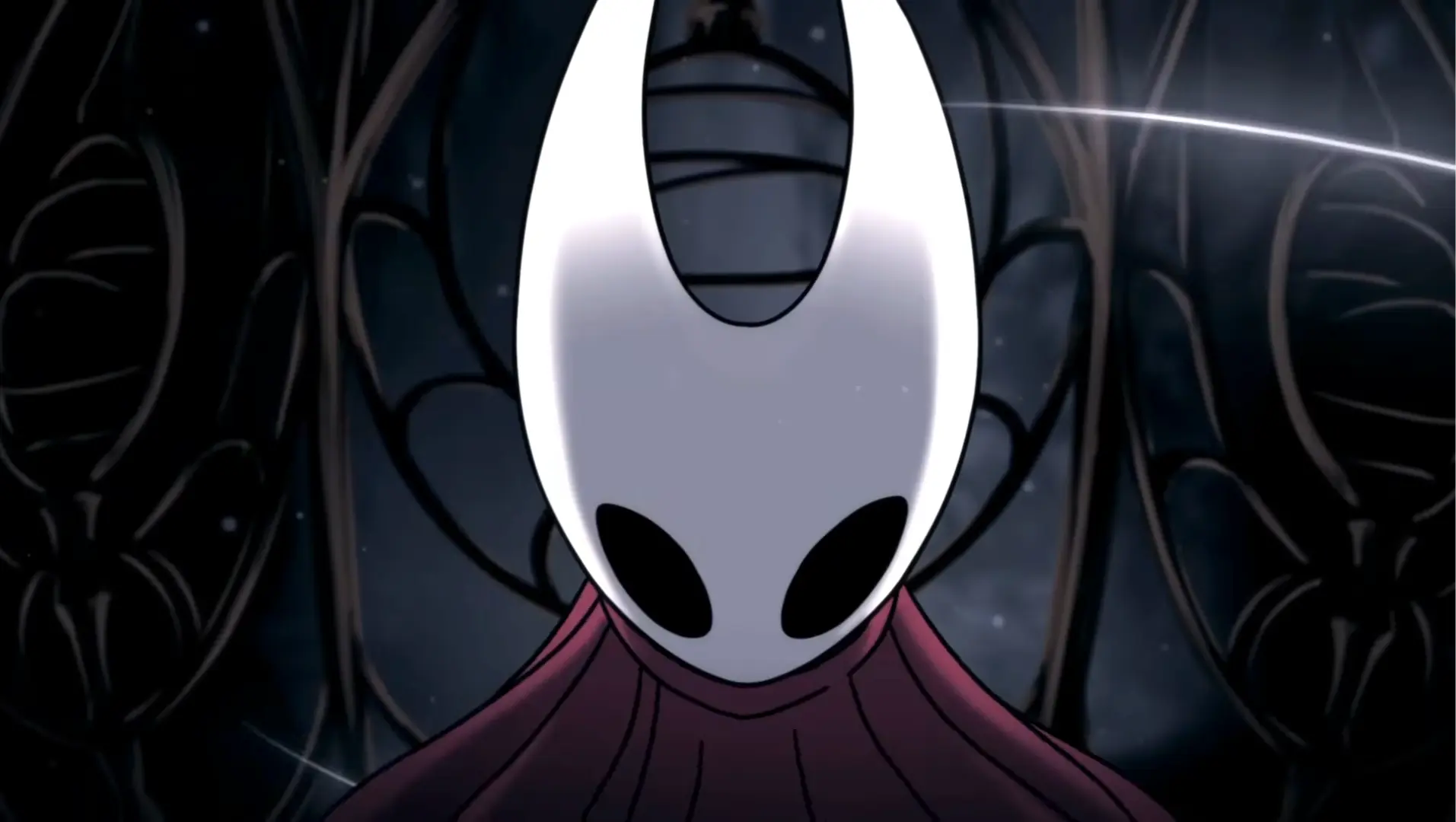 Hornet standing atop a cliff overlooking the new kingdom of Pharloom in Hollow Knight: Silksong.