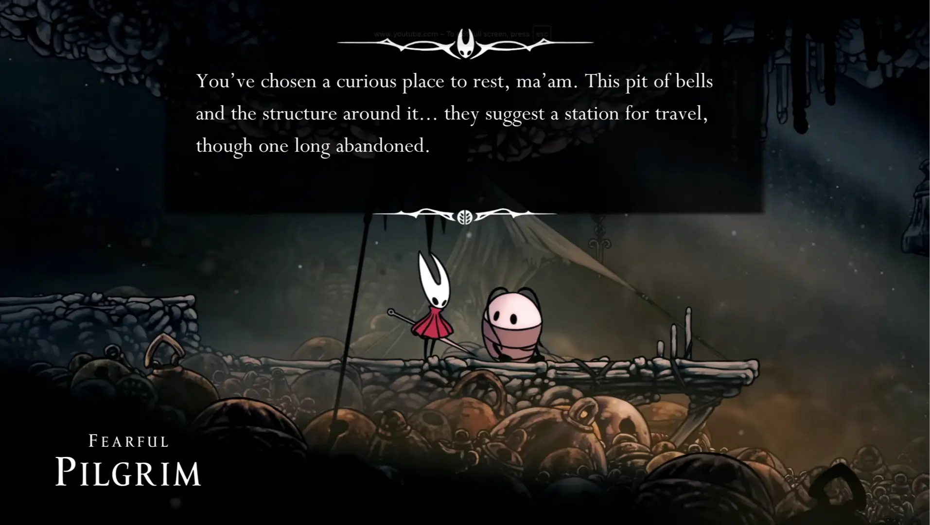 Hornet interacting with one of the many new, quirky NPCs in a Pharloom town.