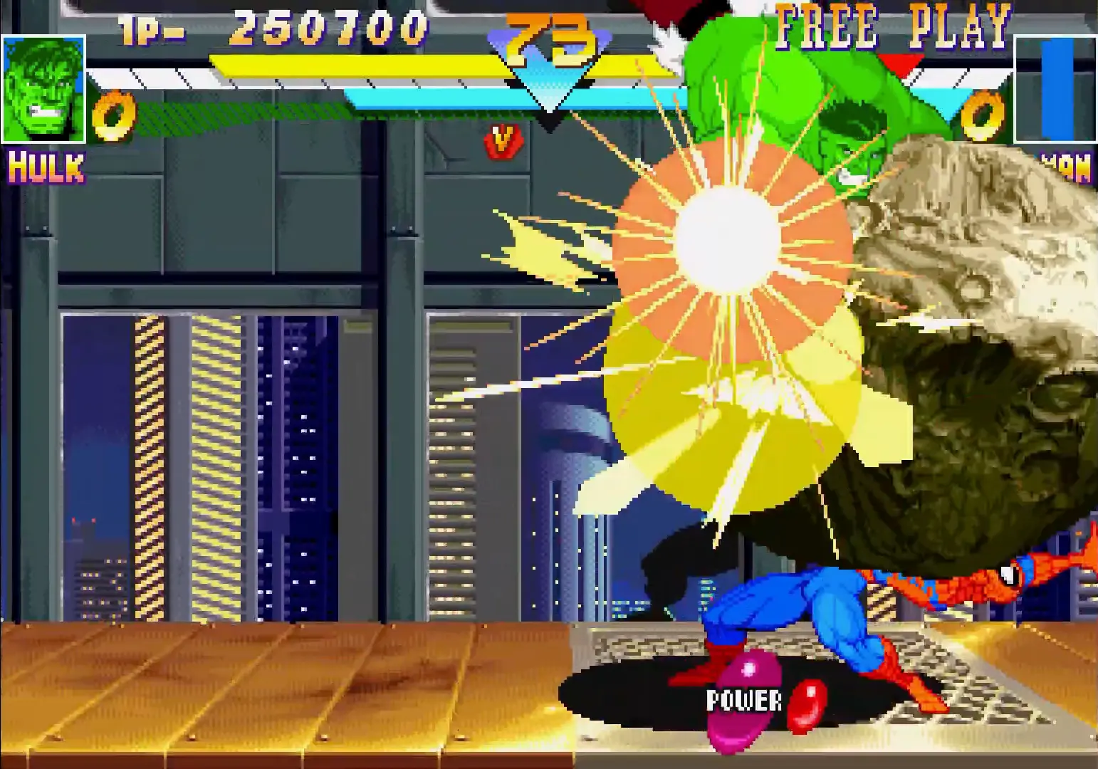 The Incredible Hulk performing a massive ground slam, causing chunks of debris and shockwaves to erupt across the stage.