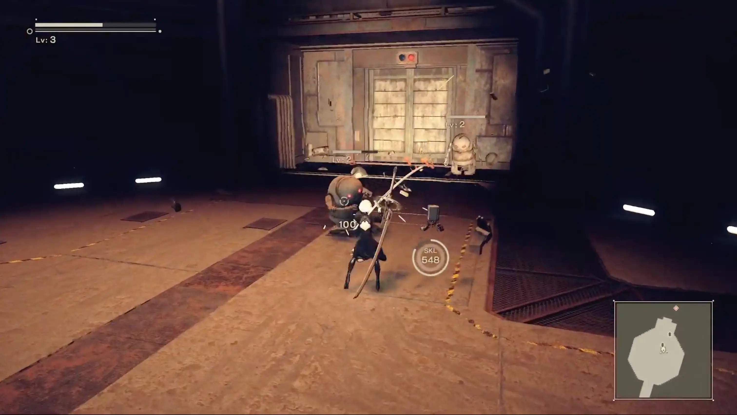 2B and 9S engaging in a massive, epic battle against a colossal, rusted machine lifeform known as a Goliath in a barren industrial zone.