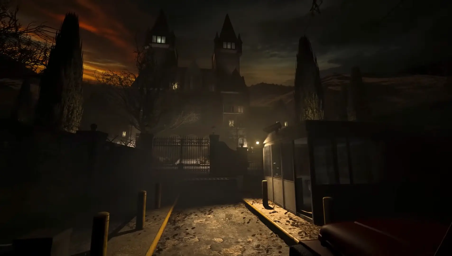 A haunting view of the towering Mount Massive Asylum exterior at night, illuminated by a lightning strike as Miles approaches the front gates.