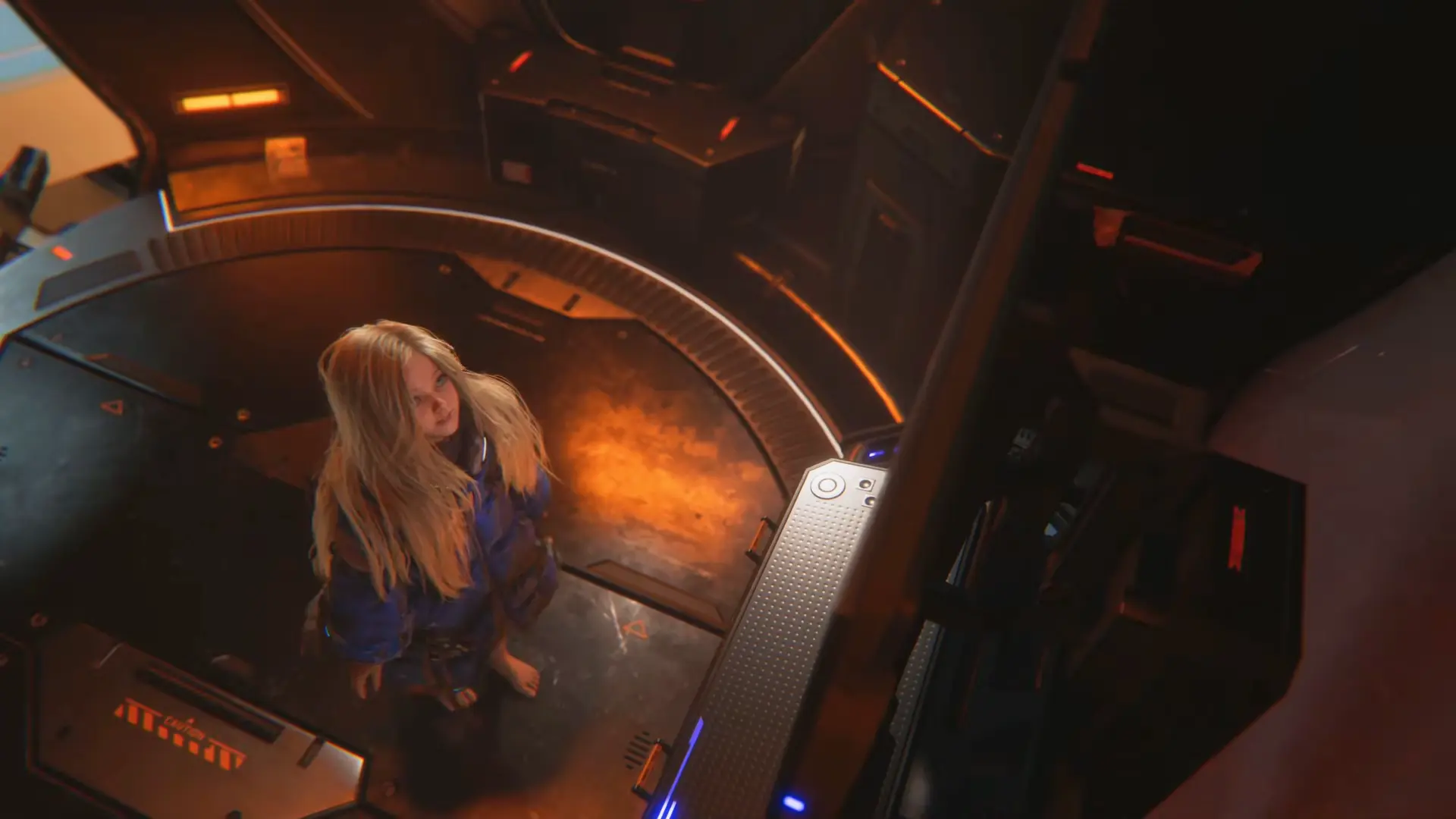 Diana standing quietly in her oversized blue puffer jacket inside a stark metal airlock that is bathed in an ominous red warning light.