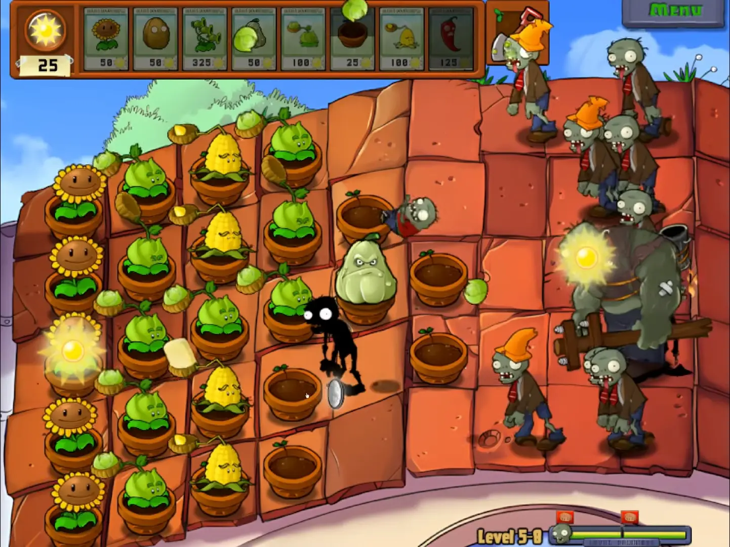 A massive Gargantuar zombie throwing an Imp into the player's defenses.