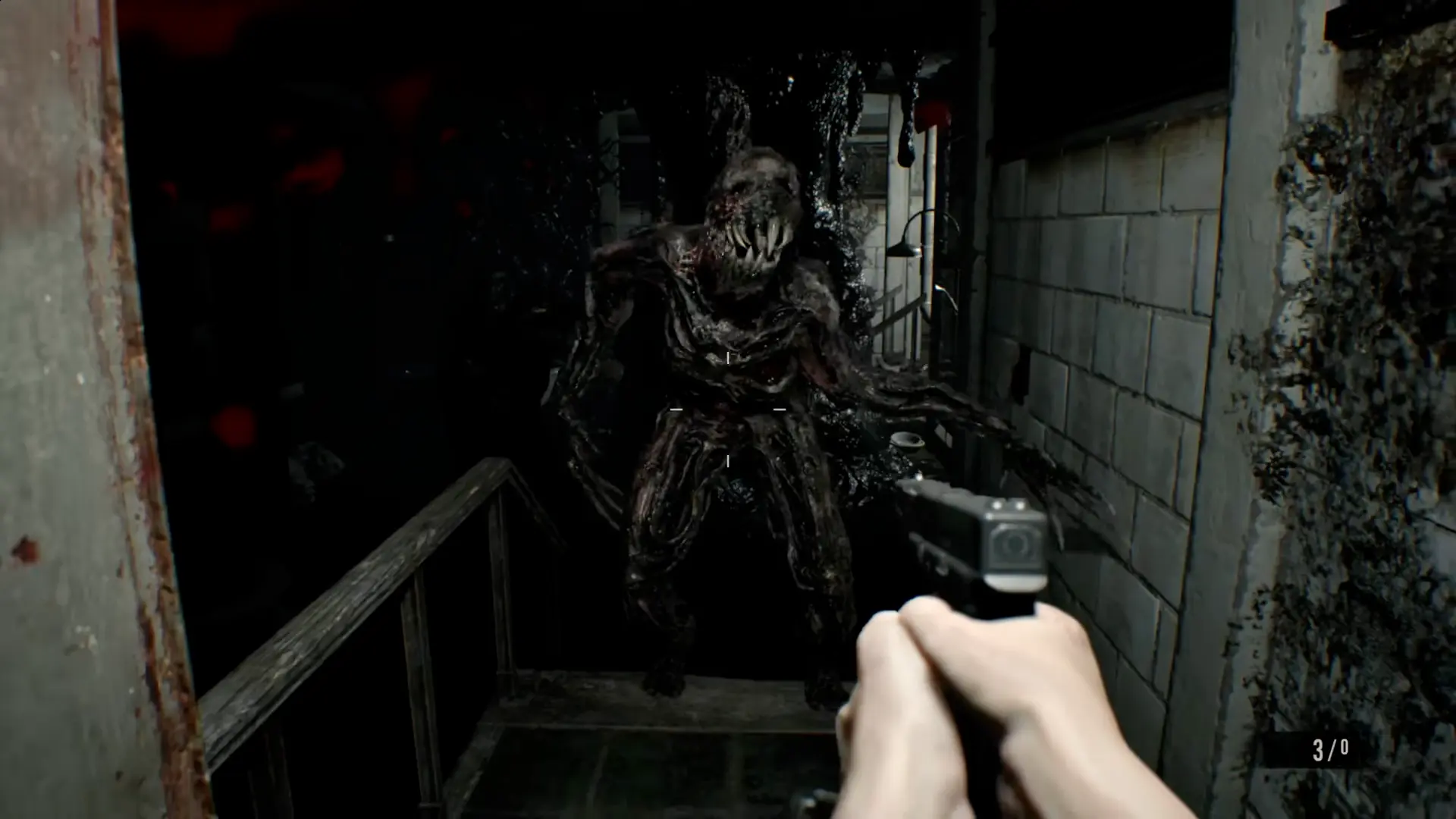 The dark, flooded Basement boiler room where a Molded creature is emerging from a pool of black liquid.