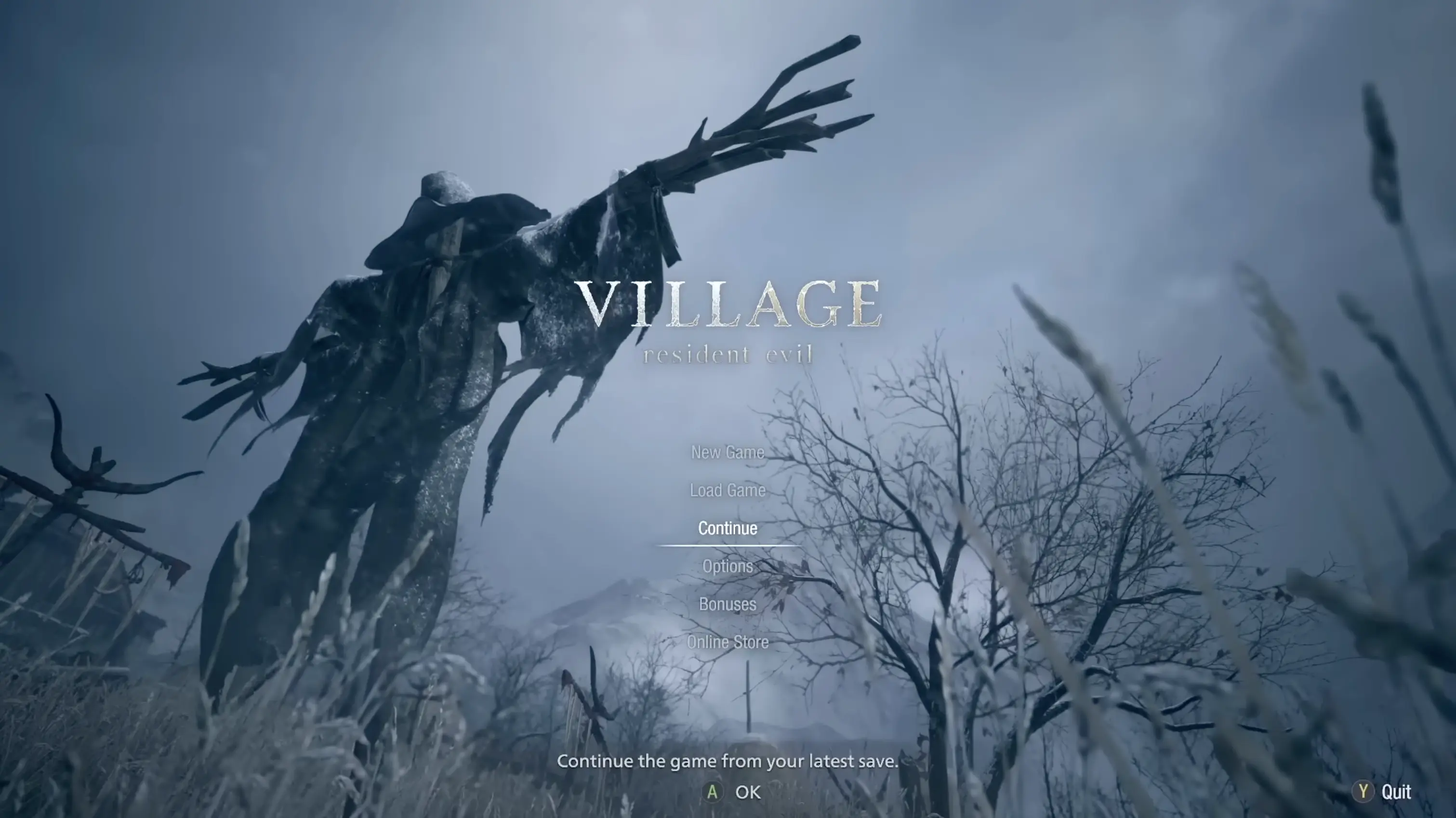 The dark, atmospheric main menu of Resident Evil Village, showing a desolate snowy field and leafless trees under a grey sky.