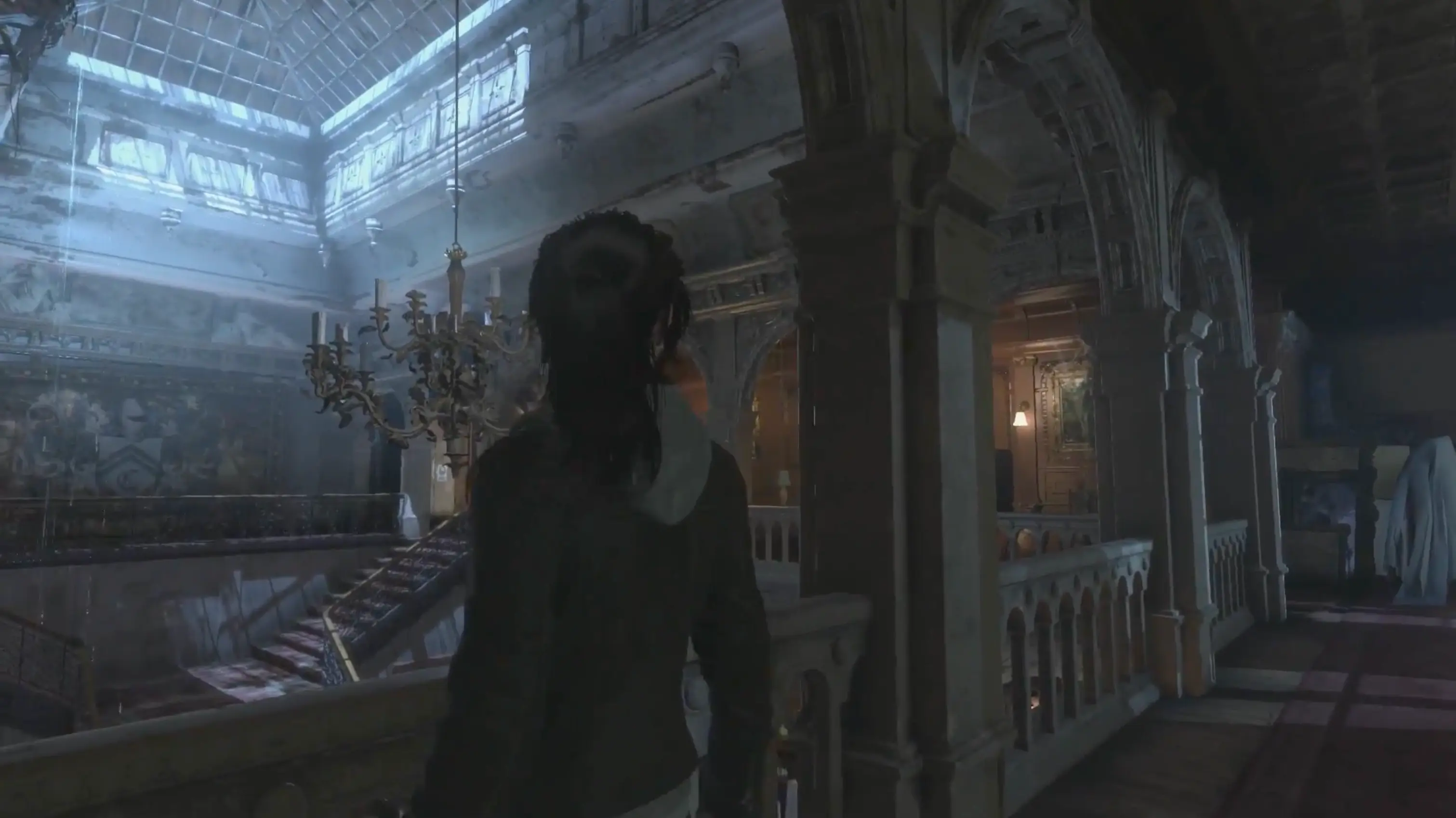 The dark, dusty, and nostalgia-filled grand hall of Croft Manor, explored during the emotional 'Blood Ties' story expansion.