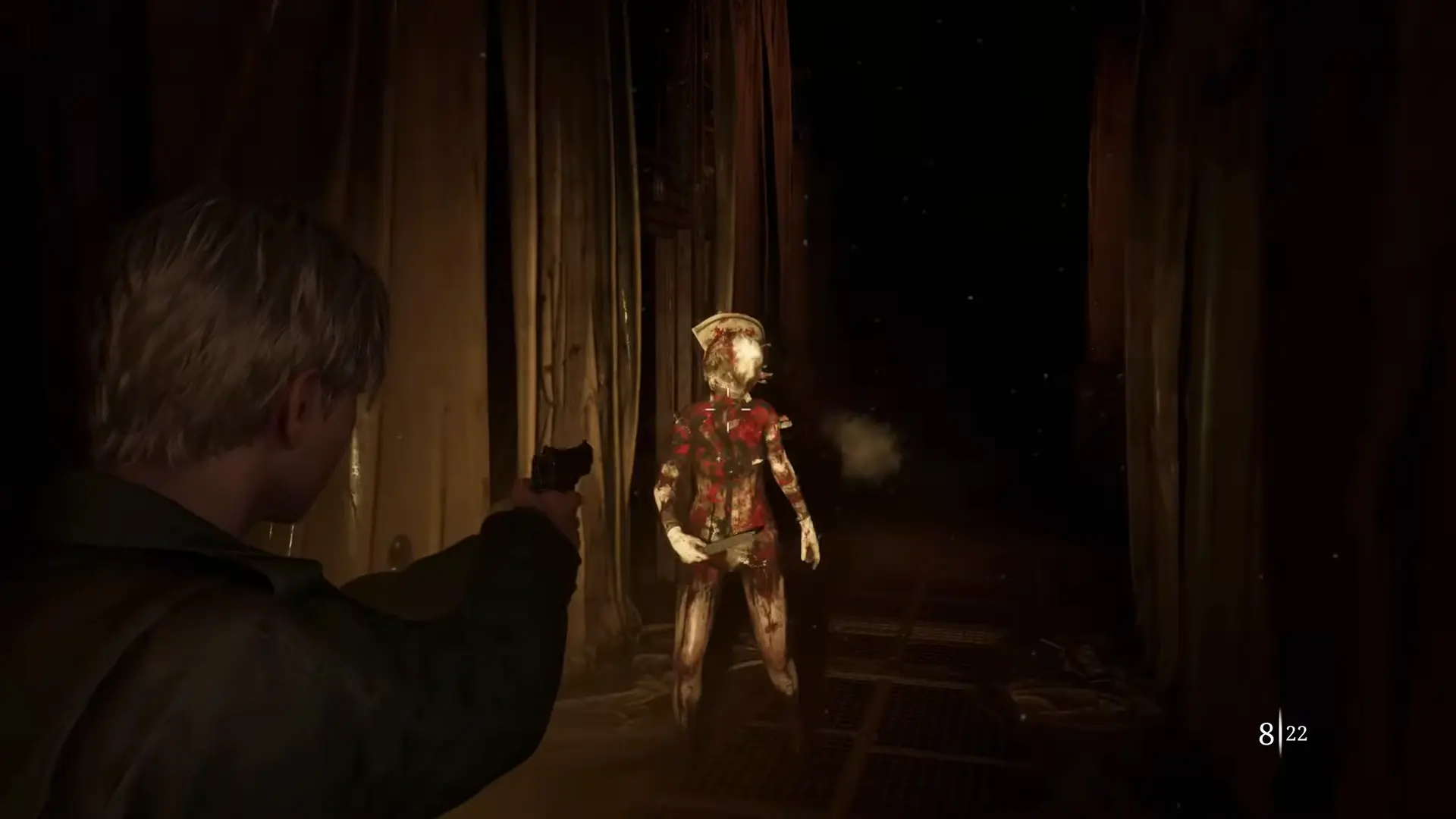 A Bubble Head Nurse twitching in the darkness, illuminated by the jittery beam of James's flashlight.