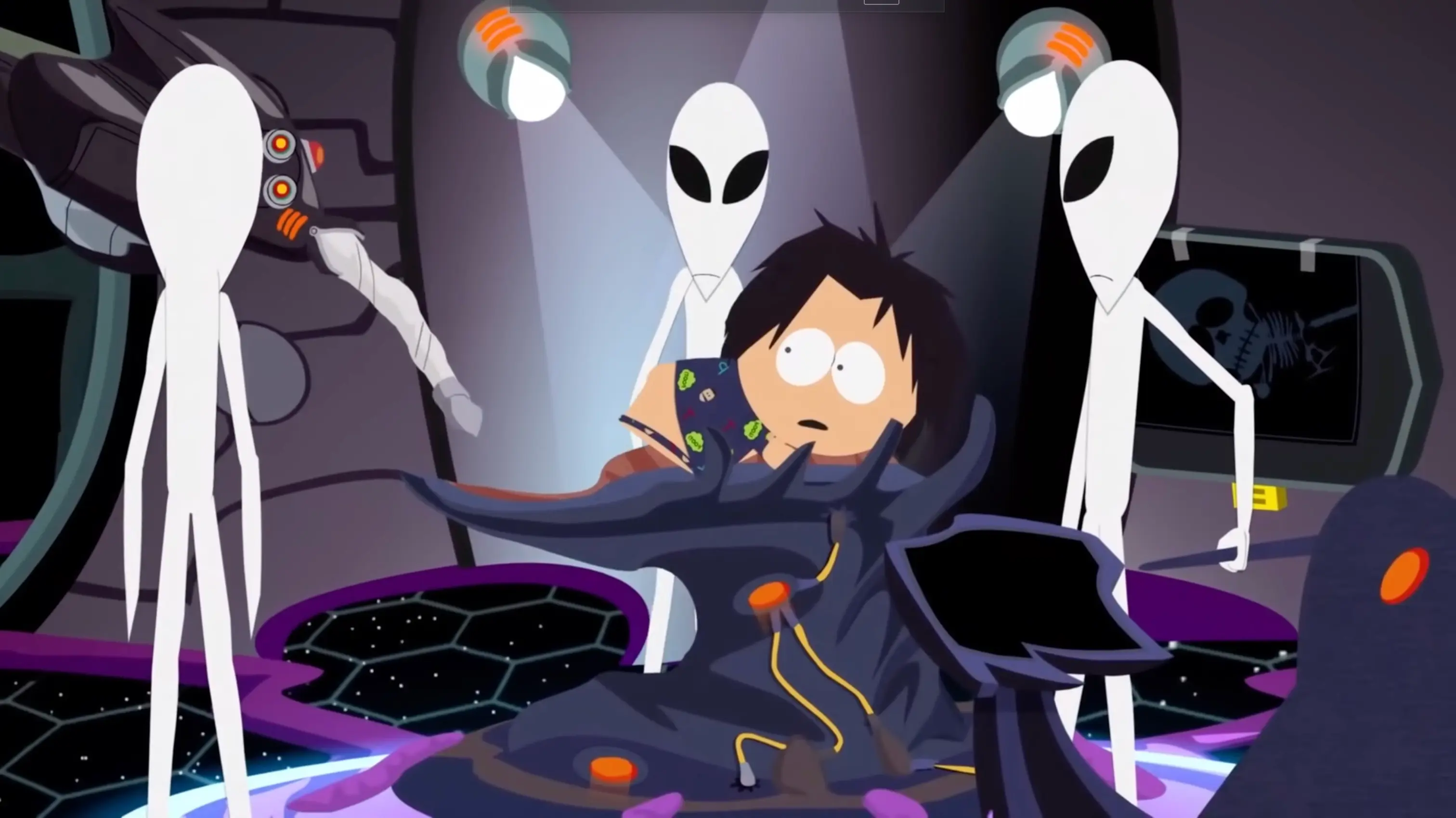 The New Kid strapped to a probing table inside a brightly lit, sterile alien spacecraft.