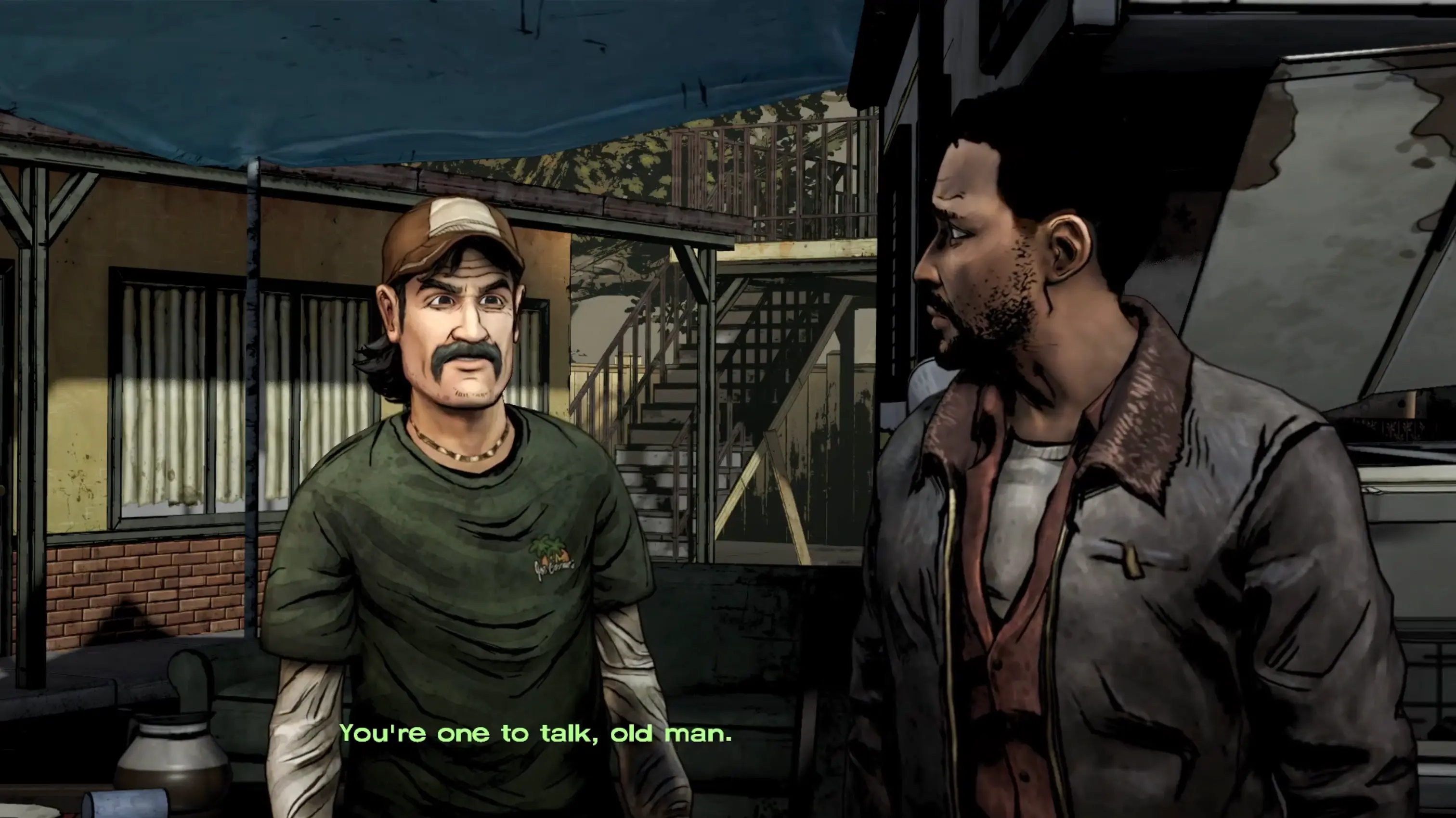 Lee and Kenny engaged in a heated argument at the motor inn survivor camp.