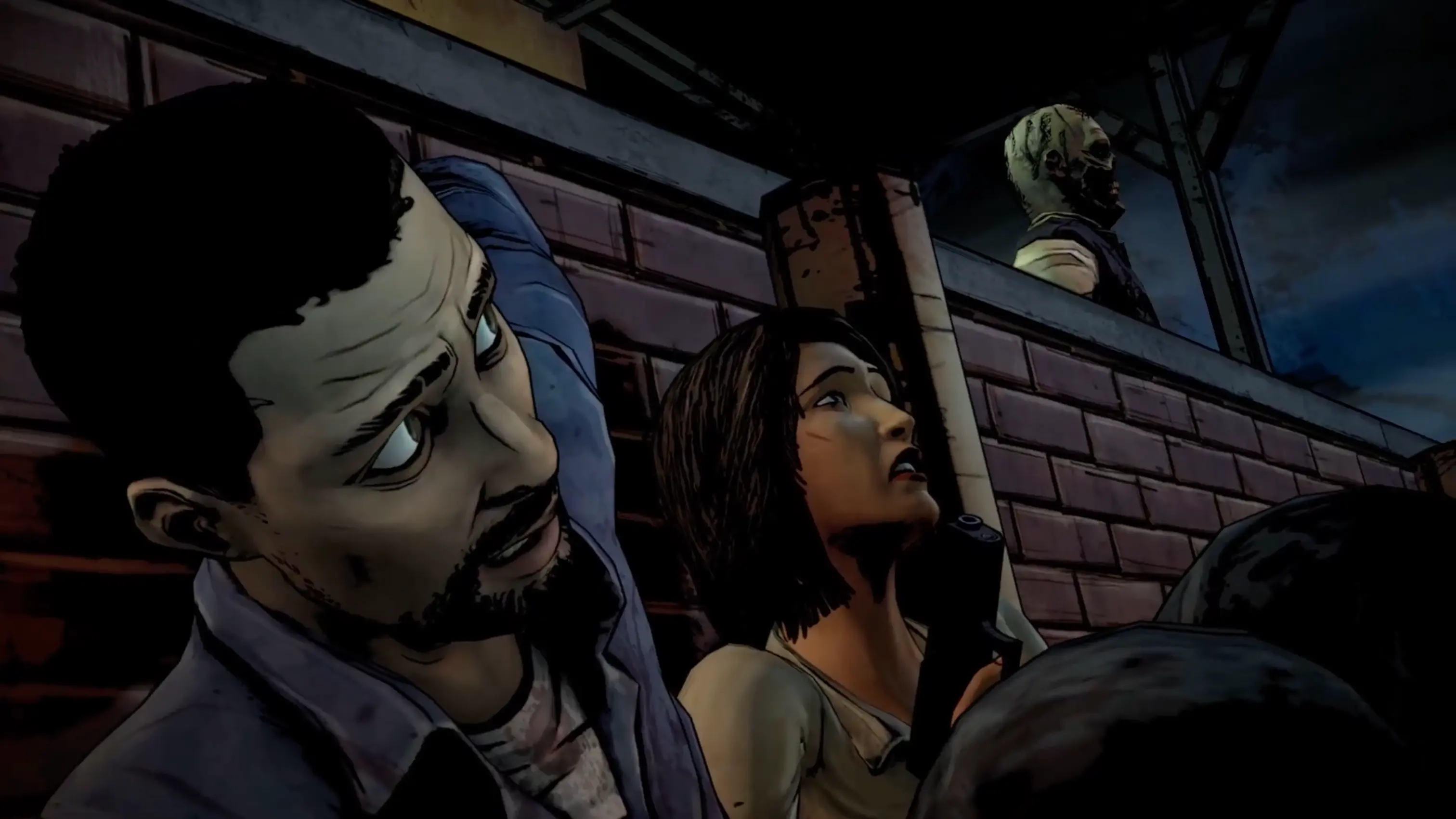 Lee frantically struggling on the ground to keep a walker's snapping jaws away from his face.