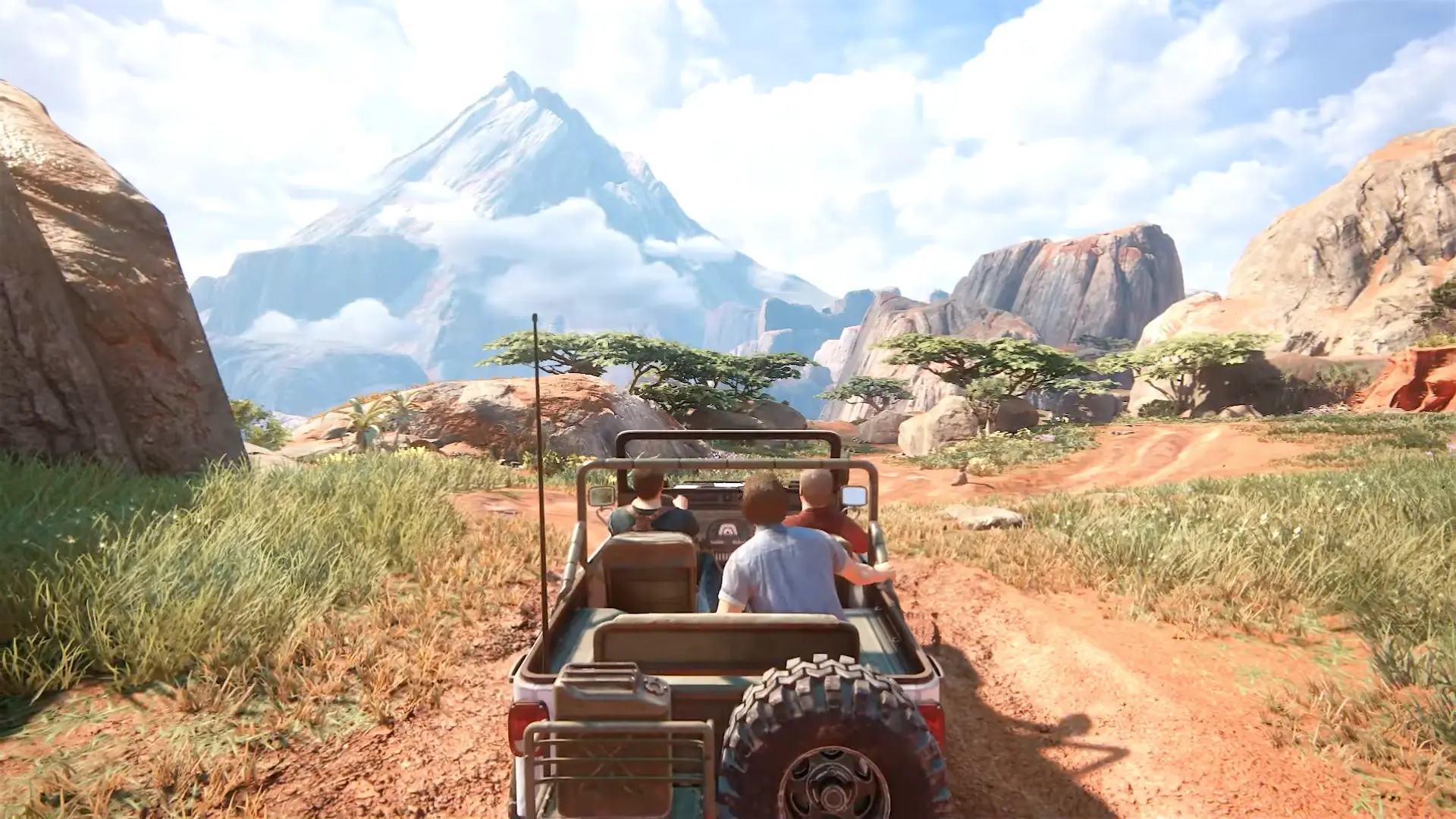 Nate, Sam, and Sully driving through the vast plains of Madagascar.