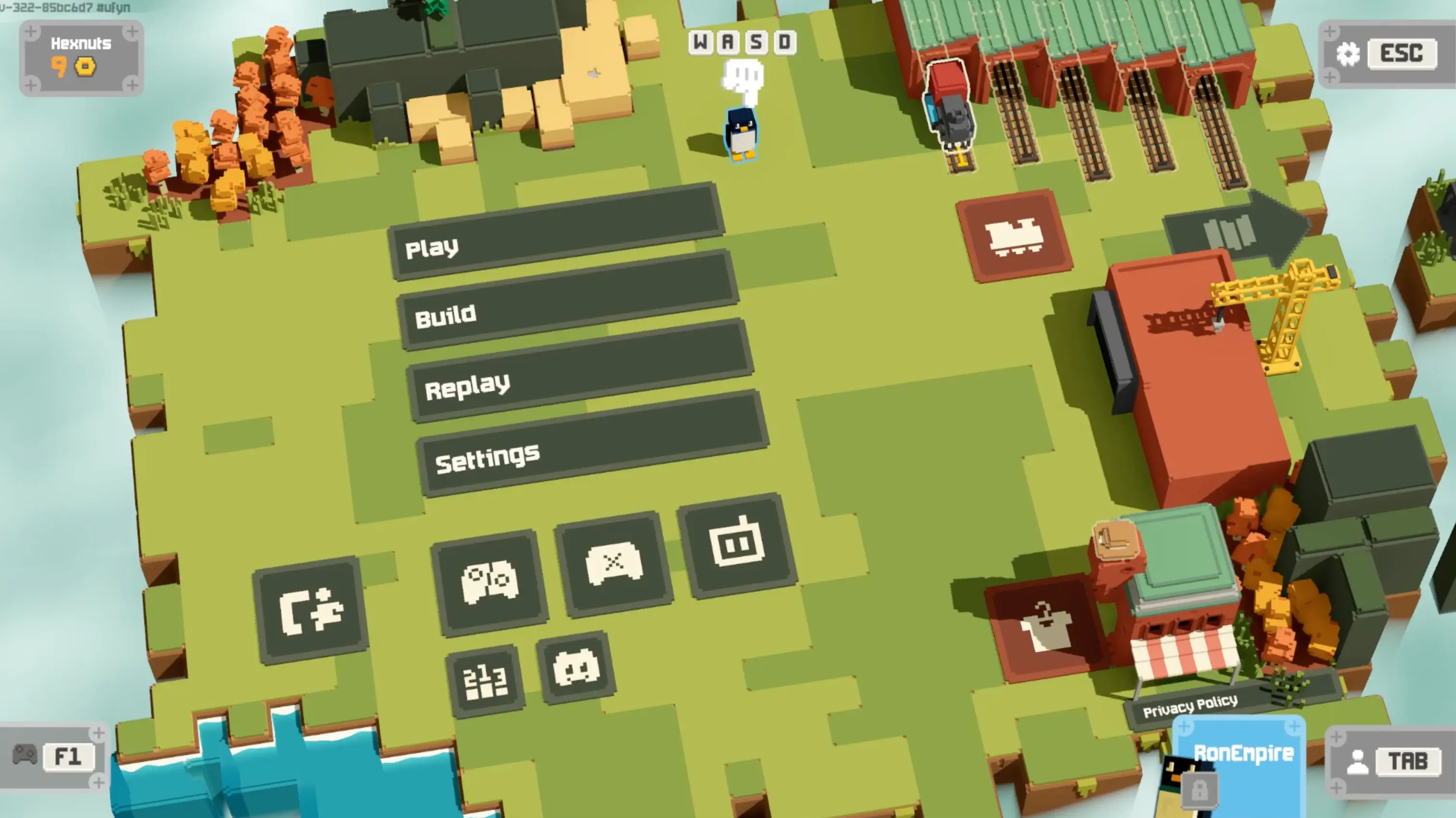The charming voxel main menu of Unrailed 2: Back on Track, showing a colorful train idling peacefully against a bright blue sky.